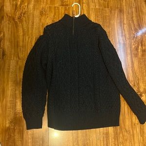 100% Merino wool cable knit sweater.